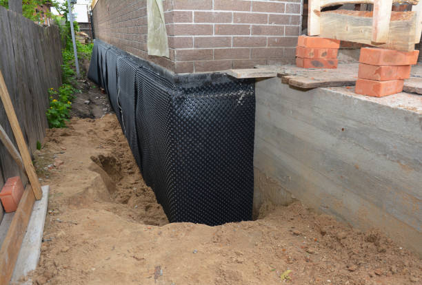 SJ Waterproofing Pros technician performing targeted Sump Pump Installation assessment in Smithfield, KY